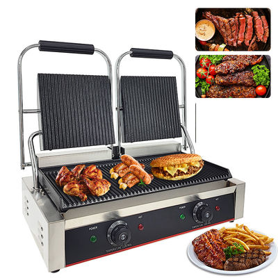 Commerciële volledig gegroeveerde elektrische grill met niet-stick gietijzer Panini Burger Press