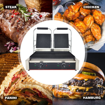 Commerciële volledig gegroeveerde elektrische grill met niet-stick gietijzer Panini Burger Press
